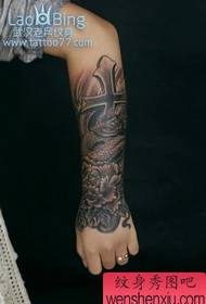 snake tattoo pattern: arm snake peony cross tattoo pattern