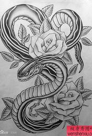 un classico popolare manoscritto tatuaggio serpente bianco e nero
