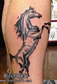 Beautiful atmospheric horse tattoo pattern on the legs