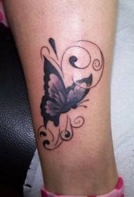 Slatki uzorak tetovaže leptira i vinove loze
