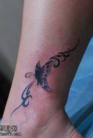 Butterfly vine tattoo pattern with beautiful legs