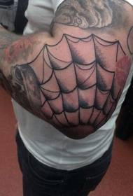 black spider web tattoo pattern on the elbow
