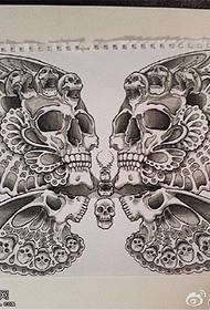 Personality skull butterfly tattoo picture