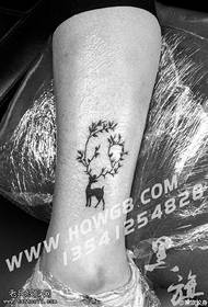 Deer tattoo on the ankle