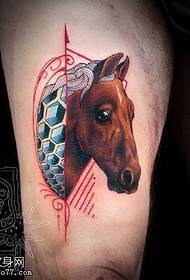 Horse tattoo on the thigh
