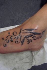 Black line creative beautiful butterfly tattoo picture on the girl's instep