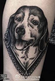 dog tattoo pattern on the calf