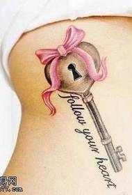 Back bow key letter tattoo pattern