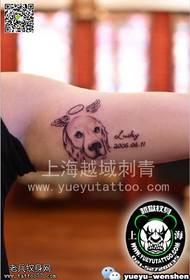 cute dog tattoo pattern on the arm