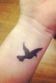 Wrist black bird tattoo pattern