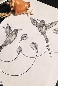 Manuscript beautiful tail bird tattoo pattern
