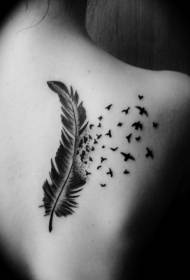 Black and white feather and bird back tattoo pattern