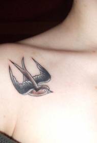 Female clavicle swallow tattoo pattern