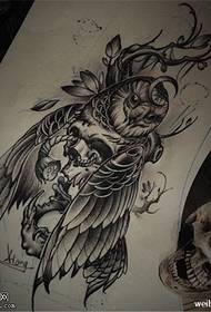 Black grey owl tattoo manuscript picture