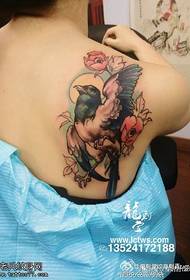 Shoulder painted bird tattoo pattern