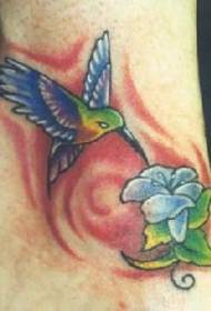 Hummingbird and flower color tattoo pattern