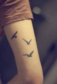 Creative black little bird arm tattoo pattern