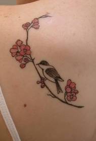 Bird tattoo pattern on the back cherry tree