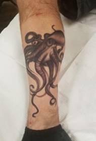Boys calf on black gray point thorn abstract line small animal octopus tattoo picture