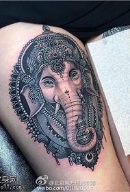 Baby elephant tattoo on the thigh