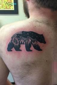 Boys back on black and white landscape with bear tattoo pictures