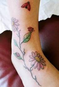 Small fresh colored daisy ladybug tattoo pattern