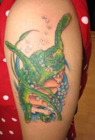 Tattoo of a green turtle swimming in the ocean