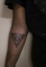 Girl's arm on black prick geometric simple line creative tree tattoo photo