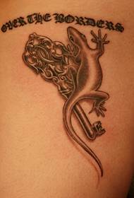 Key with gecko tattoo pattern