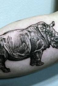 Black and white realistic style rhinoceros tattoo on the inside of the boom