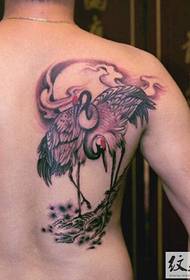 Classical ink crane tattoo