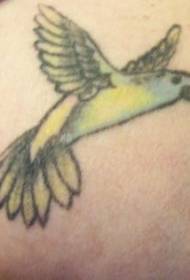 Leg colored yellow hummingbird tattoo picture