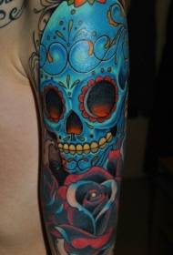 Braço no crânio mexicano azul tatuagem padrão