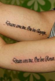 couple inside the arm of the romantic English alphabet tattoo pattern