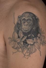 Didelis gražus juodo orangutano ir lapų tatuiruotės raštas