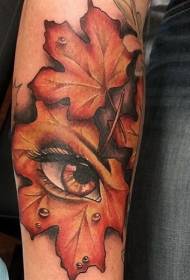 arm natural maple leaf with mysterious eye tattoo pattern