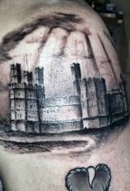 腕の驚くべき黒と白の古い中世の城のタトゥーパターン