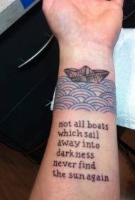 wrist paper boat and blue spray letter tattoo pattern