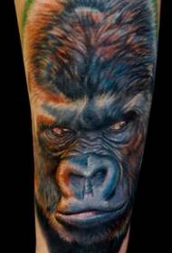 arm colored gorilla head tattoo pattern