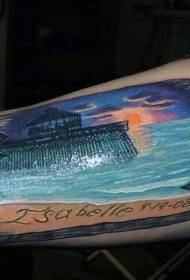 arm colored beautiful ocean sunset and letter tattoo pattern