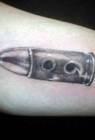 black and white small bullet tattoo design on the arm