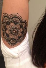 cute black mandala flower tattoo pattern on the inside of the arm