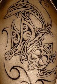 tribal style black and white dolphin totem arm tattoo pattern