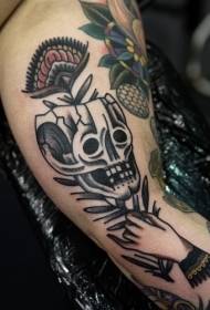 old school arm skull with hand flower tattoo pattern