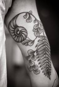 unusual plant sting tattoo pattern on the arm