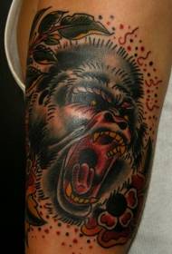 arm colored old school orangutan with floral tattoo pattern