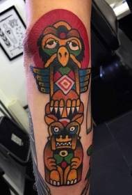 individuality of colorful tribal god statue arm tattoo pattern