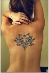 Female back vanity lotus tattoo pattern