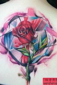 Beautiful colorful rose tattoos on the back of girls