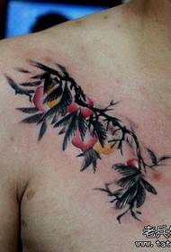 Male chest with a peach tattoo pattern